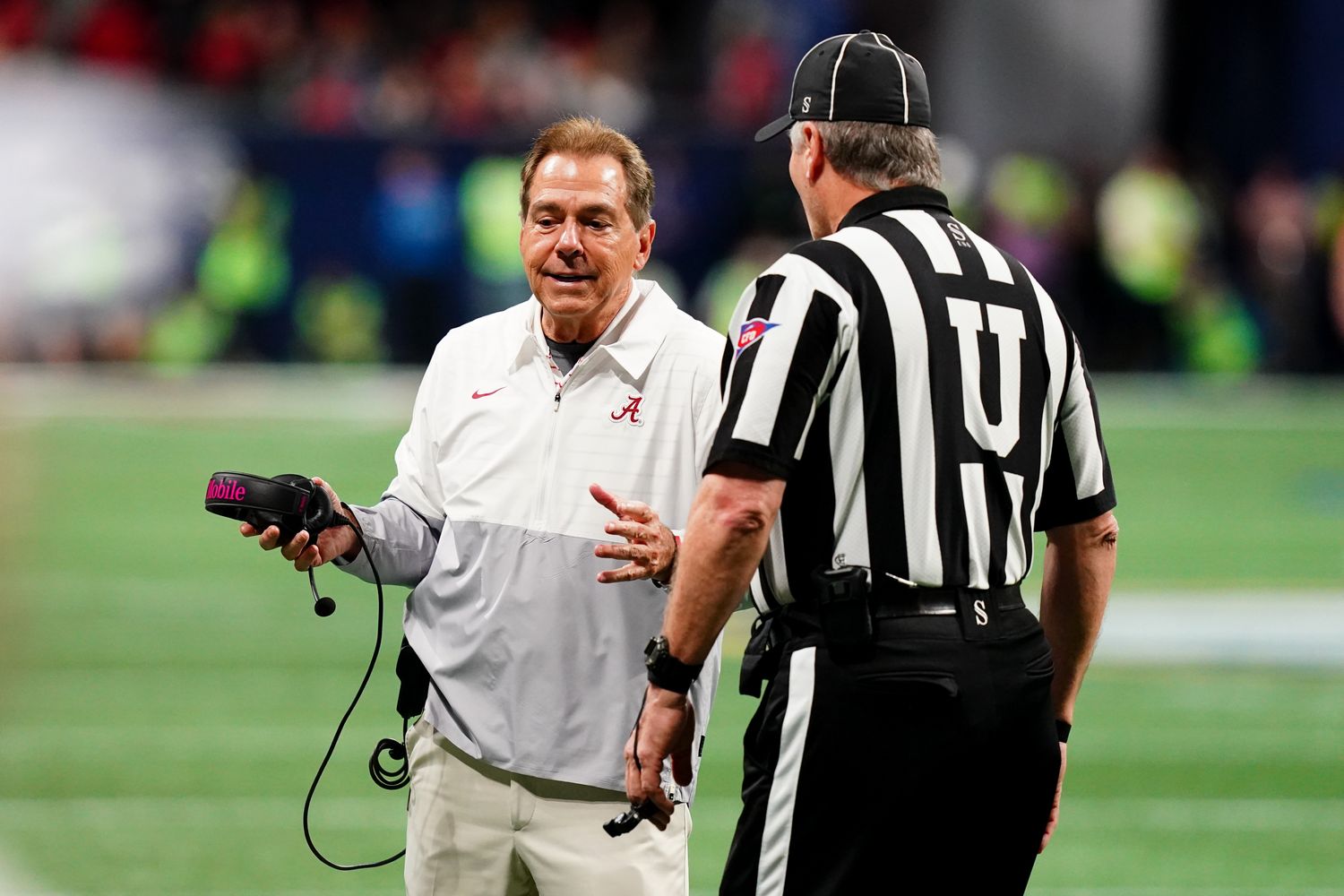 Dec 2, 2023; Atlanta, GA, USA; Alabama Crimson Tide head coach Nick Saban talks with an official in the second quarter against the Georgia Bulldogs in the SEC Championship at Mercedes-Benz Stadium.